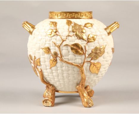 Royal Worcester cream and gilt weaved basket vase, 21cm high. 