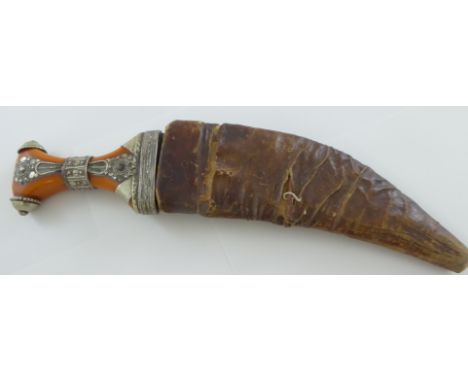 A Middle Eastern dagger with silver mounts, leather scabbard with indistinct Arabic mark, L.34cm