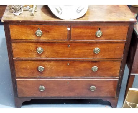 George III mahogany chest of two short over three long graduated drawers with fluted sides and on bracket feet, width 41in