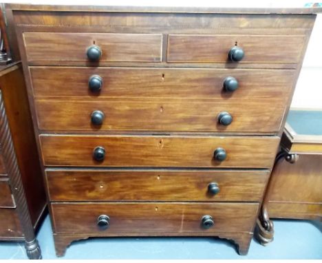 Regency mahogany banded secretaire chest of drawers, the rectangular top with two short drawers over the pull out secretaire 