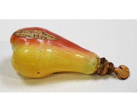 A Bilston enamel scent bottle, circa 1750/60, coloured enamel in the form of a pear, gilt metal collar and stopper, old label