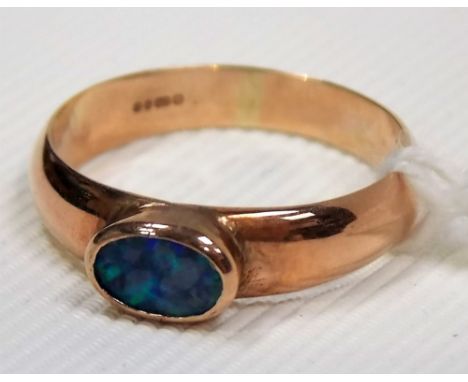 9ct rose gold ring set with an oval black opal, weight 1.9g approx