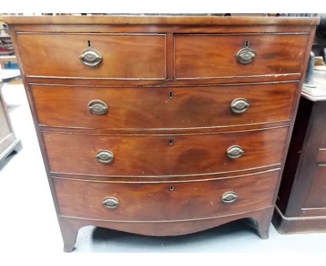 Late George III mahogany cross banded bow front chest of two front over three long graduated drawers upon splayed bracket fee