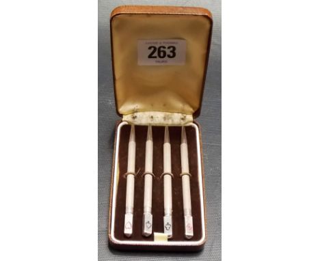 Set of four sterling silver engine turned cased propelling pencils for cards, the finials with hearts, clubs, spades and diam