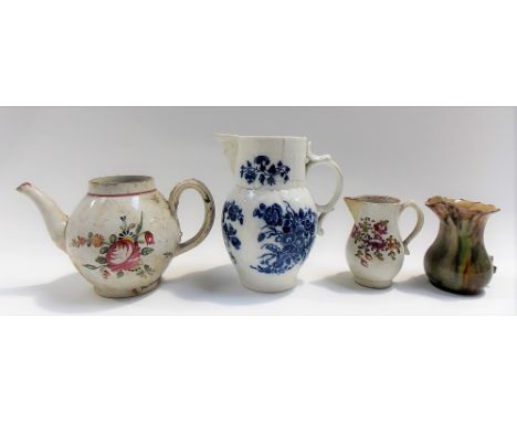 18th Century Caughley blue and white transfer printed relief moulded jug decorated with floral sprays and with mask spout, pr