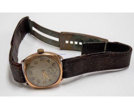 9ct gold cased early 20th Century lug manual wind wristwatch, the silvered dial with Arabic numerals and subsidiary seconds d