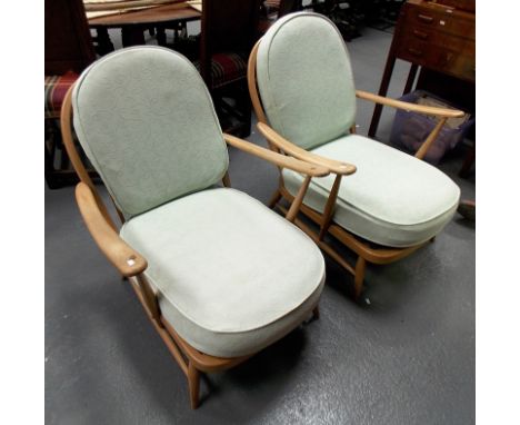 Pair of Ercol low armchairs.