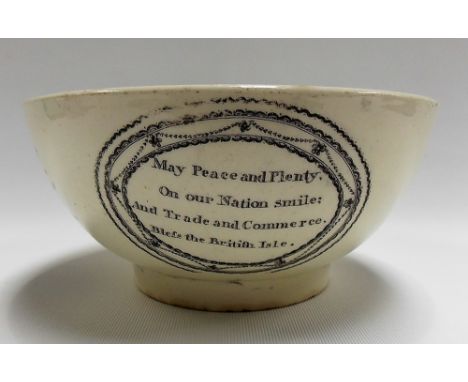 Late 18th Century creamware black and white transfer printed bowl, the sides decorated with a compass, a figure with sextant 