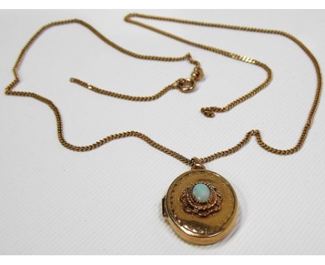 Yellow metal oval locket set an oval opal; upon a slender curb link necklace (broken), weight overall 4.6g approx