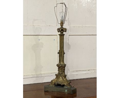 A Rococo style gilt metal table lamp on scrolling triform platform base, 68cm high