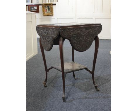 A dark stained and carved side table the square top with four shaped drop leaves, with under shelf, on slender cabriole legs 