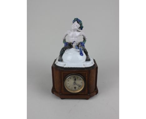 A small porcelain mounted burr wood mantle clock, Swiss movement by Franz Morawetz Wien, mounted with a Ferdinand Liebermann 