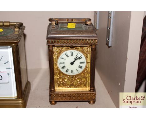 A 19th Century brass cased carriage clock with filigree work decoration stamped R &amp; Co. France 