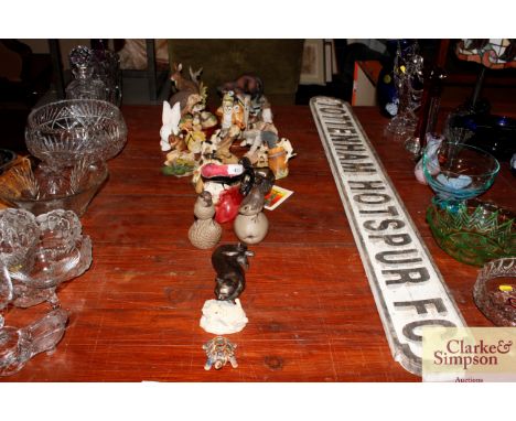 A collection of various ornaments to include Poole pottery birds, various other animals, character jug etc.
