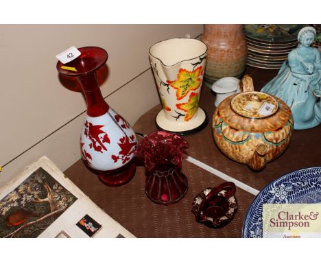 Three ruby glass vases 