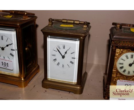 A brass cased striking carriage clock