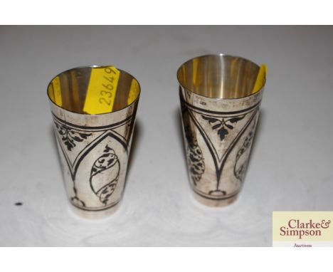 Two Russian silver Vodka cups