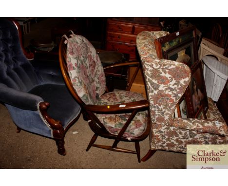 An Ercol stick back armchair 