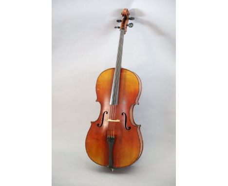 A late 19th/early 20th century German cello, labelled 'Schutz HD junior Marke', with little curl to the sides, back and neck,