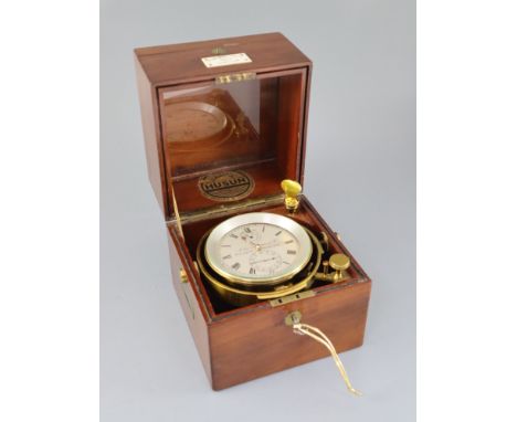 John Morton &amp; Co. of Glasgow. A mahogany cased 2.5 day marine chronometer, with brass mounted case, silvered dial with up