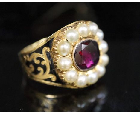 A George IV gold, black enamel, oval cut foil backed garnet and split pearl cluster set mourning ring, the underside of the r