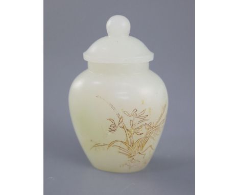 A Chinese miniature white jade inscribed jar and cover, of flattened ovoid shape, one side engraved and gilded with flowers a