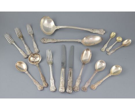 An Edwardian part canteen of silver Queens pattern double struck flatware by Jacques &amp; Bartholomew, with engraved initial