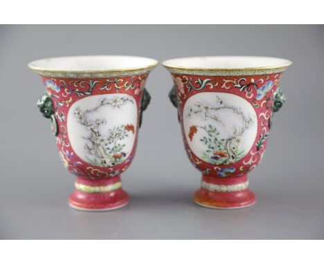 A rare pair of Chinese yangcai 'New Year Longevity' stem cups, Qianlong or Jiaqing period, each of inverted bell shape with m