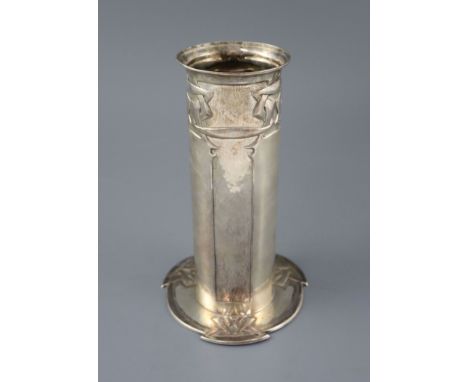 An Edwardian Art Nouveau Liberty Cymric silver cylindrical vase, Birmingham 1904, on stylised shaped circular foot, 21.3cm, 1