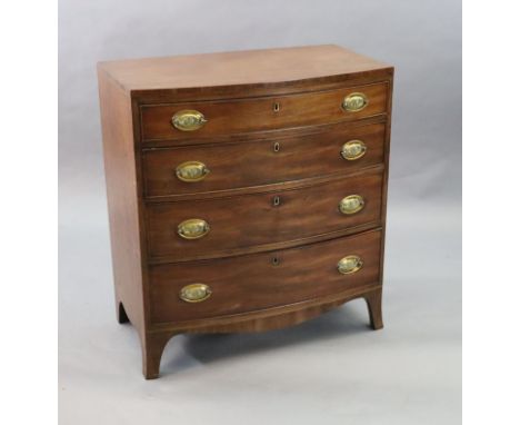 A small Regency mahogany bowfront chest, of four graduated long drawers on swept bracket feet, W.2ft 6in. D.1ft 4.5in. H.2ft 