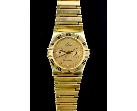 A gentleman's 1980's 18ct gold Omega Constellation quartz wrist watch, the yellow dial with dot numerals and day date subsidi