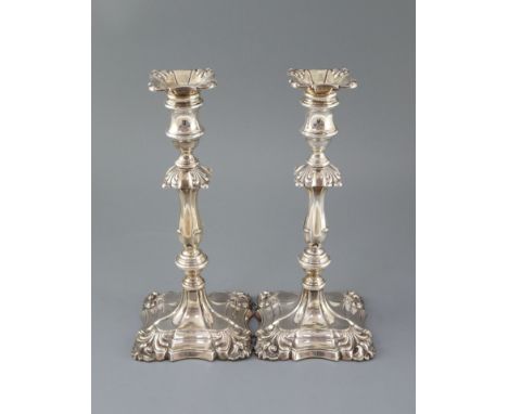 A pair of Edwardian silver candlesticks by William Hutton &amp; Sons, with waisted knopped stems, London, 1903, 29.6cm, weigh