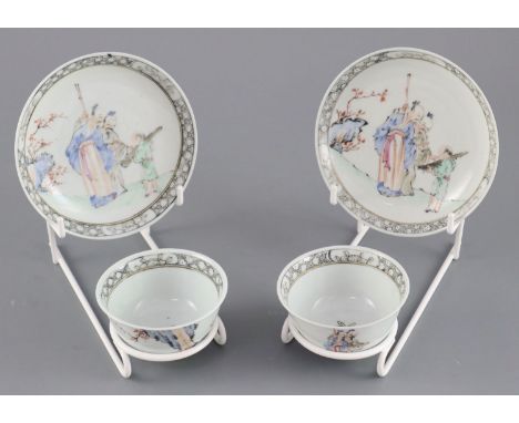 A pair of Chinese famille rose 'sages tea bowls and saucers, Qianlong period, each painted with two sages and an attendant bo