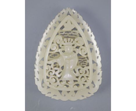 A Chinese pale celadon jade plaque, in Tang dynasty style, carved in relief and openwork with a central figure of an immortal