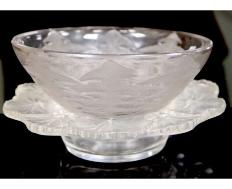 René Lalique. A pre-war Pissenlit No.1 pattern bowl, no.3215, designed in 1921 and a post war Lalique leaf pattern bowl, Piss