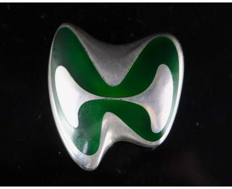 A late 1960's Danish Georg Jensen silver and green enamel abstract brooch, designed by Henning Koppel, design no. 315, 37mm, 