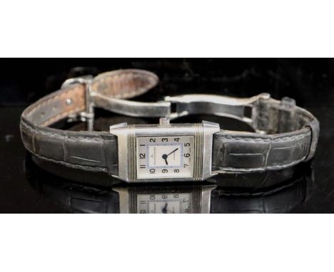 A lady's stainless steel Jaeger LeCoultre Reverso quartz wrist watch, on leather strap with Jaeger LeCoultre buckle, with Ara