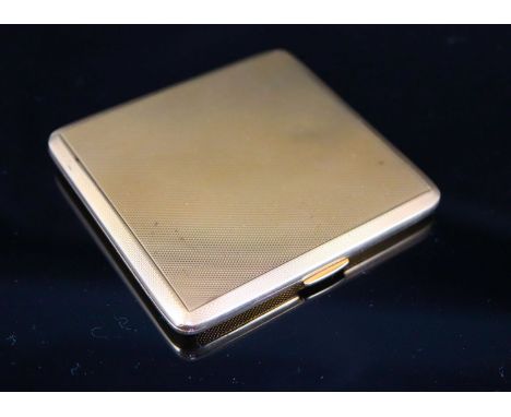 A George V engine turned 9ct gold cigarette case, with interior inscription, 83mm, gross 106.6 grams.CONDITION: A few minor b