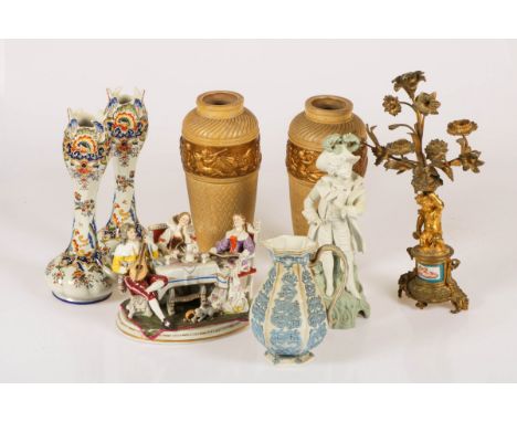 A lot with various items, a.w. a figurine, 20th century. Together with (2) Portuguese vases, a candelabre with Limoges-plaque