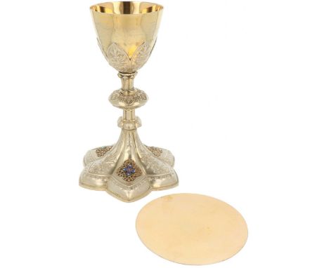 Chalice and paten silver. Richly decorated model with embossed decorations, gilding and filigree soldered on.&nbsp;As well as