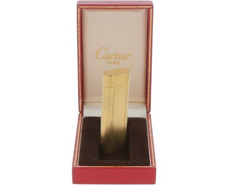 Cartier lighter. Complete with original box.&nbsp;France, Paris, 20th century, traces of use and dents.&nbsp;82.8 grams, gold