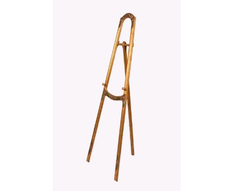 A gold painted display easel, France, mid. 20th century. With carved roses. Meas. H: 170 cm. Estimate: € 20 - € 30.
