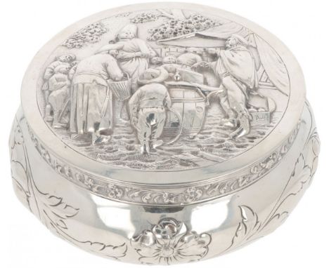 Biscuit tin silver. Beautiful round model with a convex shape, decorated with a passionate scene and a flower border. Netherl