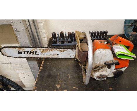A Stihl petrol chainsaw, model 08/S, 22" blade, instruction book.