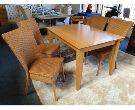 A light oak dining table, 120 x 85 cm together with four contemporary Lloyd Loam dining chairs (5).