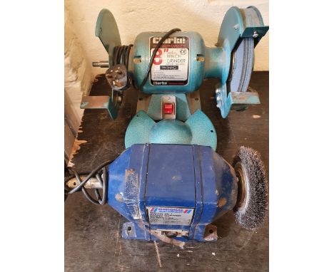 A Clarke 8" bench grinder, model CBG8RSC, lacking one cover and a National Machinery 6" bench grinder, model BG150CX/94 (2).