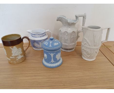 A Doulton earthenware mug, a Victorian relief moulded jug a Wedgwood Jasperware tea caddy, together with other ceramics and c