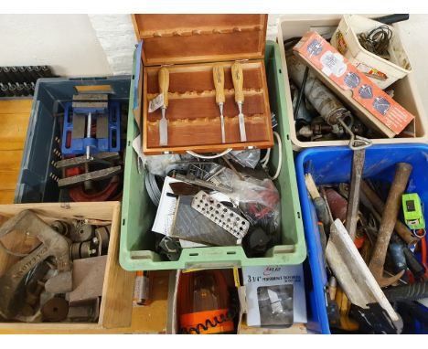 A quantity of tools, to include chisels, G clamps and scaffolding clamps.