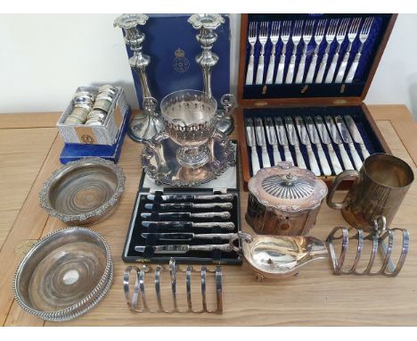 A Victorian mother of pearl handled dessert service for 11 place settings, a set of silver handled tea knives and other plate