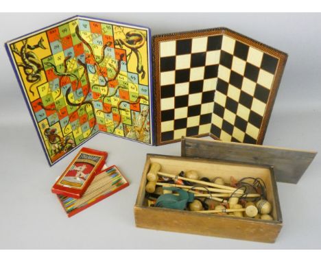 An early boxed table croquet set, together with a boxed 'Pik-A-Styk' by H. P. Gibson &amp; Sons and two Chad Valley boards 'C